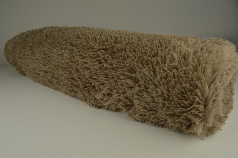 Langhaarfell taupe, Rolle