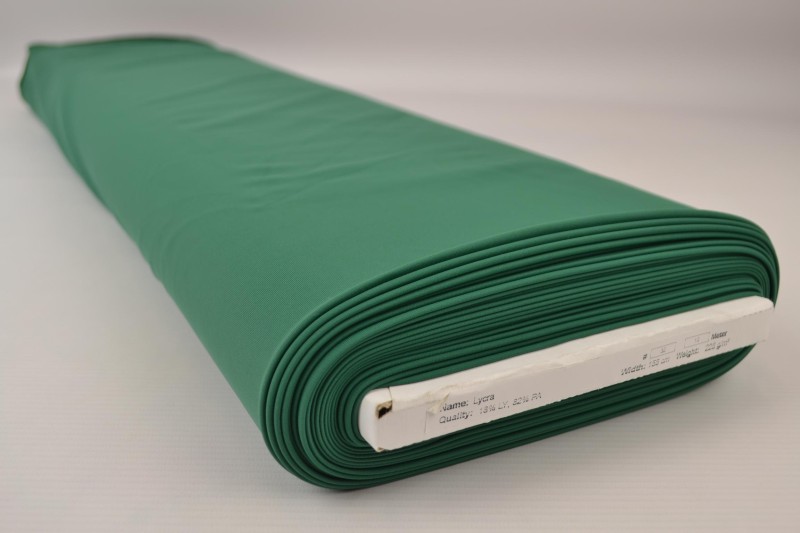 Lycra dunkelgrün, Rolle