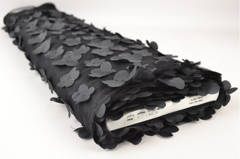 Mesh Blume schwarz, Rolle
