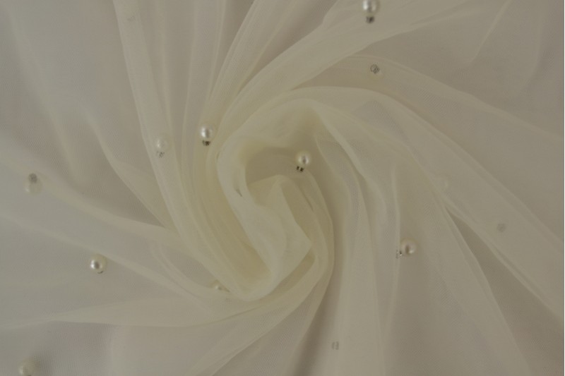 Mesh Perlen champagnerr, Rolle