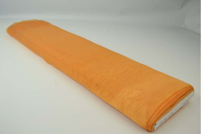 Organza ocker, Rolle