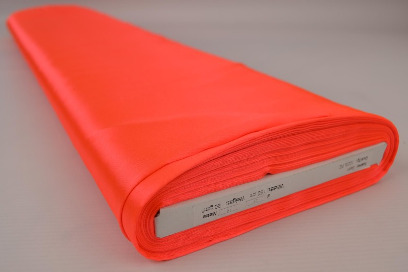 Polyestersatin Satin orange néon, Rolle