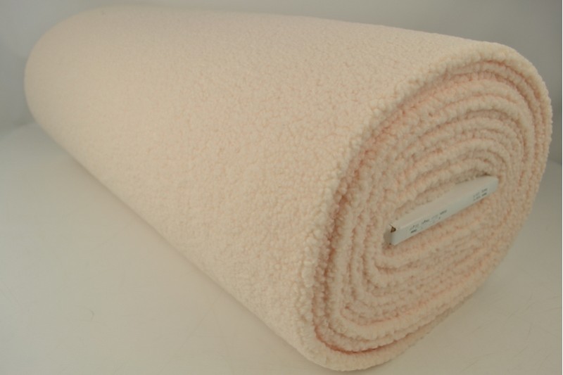 Teddy-Kunstfell champagnerr, Rolle