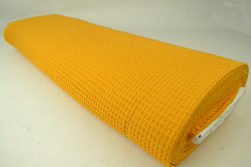 Waffelpiqué Stoff ocker, Rolle
